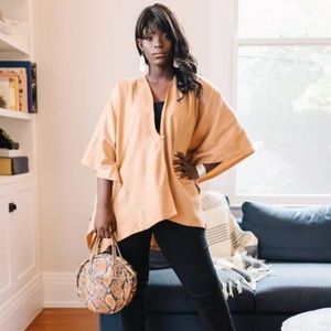 Sseko Designs Cashmere Poncho Wrap - Camel color.